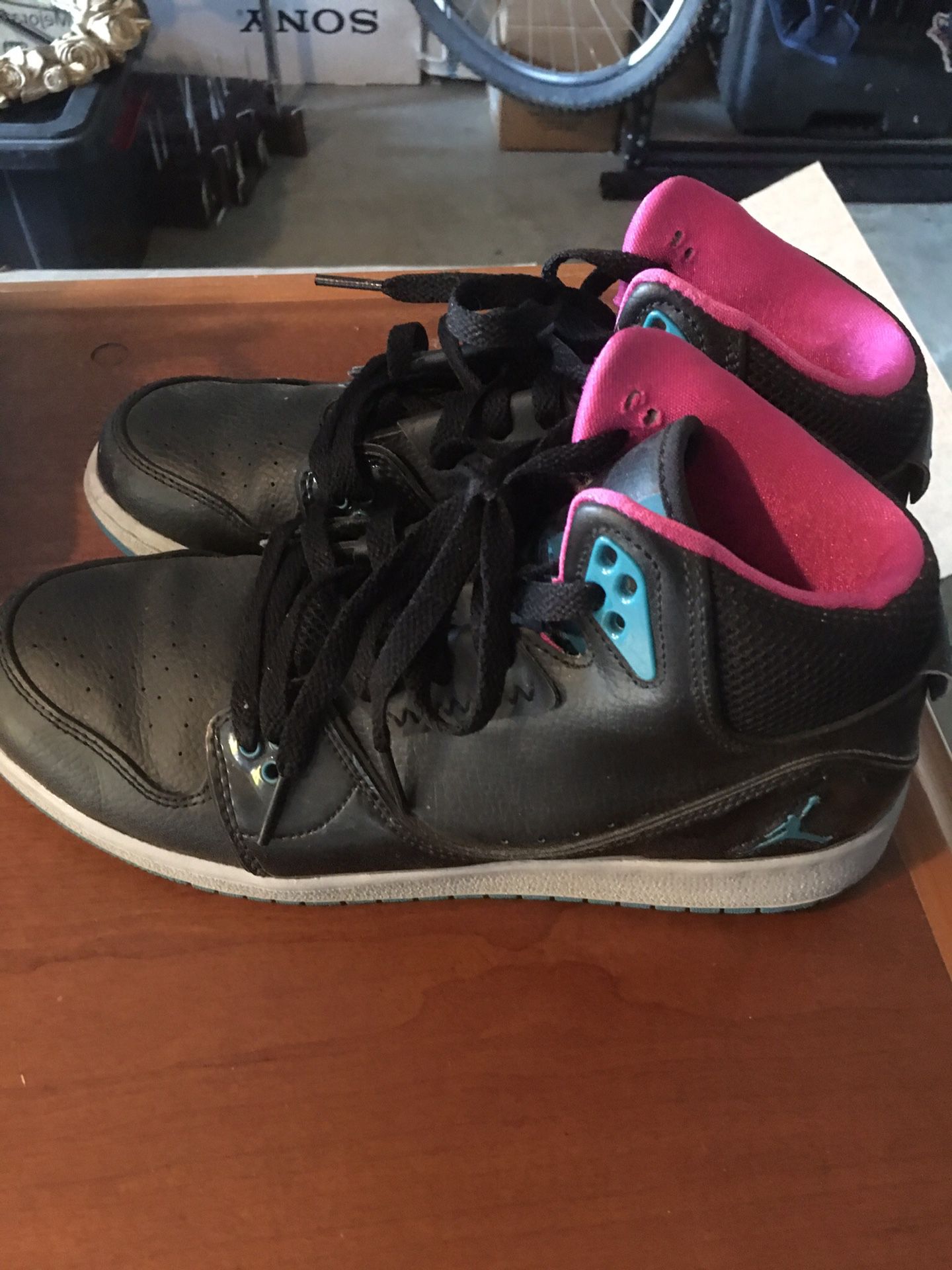 Nike Air Jordan shoes throw back leather black with pink and teal accents like new size 7Y rare collectors itemk