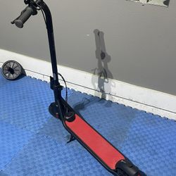 Electric Scooter. New!!!   Box And Charger Included 
