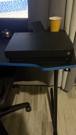 ✅ Xbox One X 1TB ✅ Pink controller included ✅ Works properly ✅ HDMI + power cable included ✅ Great for Fortnite, Call of Duty, GTA, and more ✅ Ready t