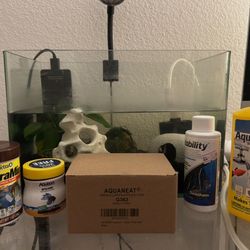 3.5 Gallon fish tank with accessories and food!