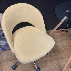 Beautiful Yellow Chairs On Wheels. 