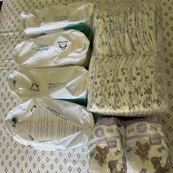 220 NEWBORN DIAPERS (read description and see all pictures)