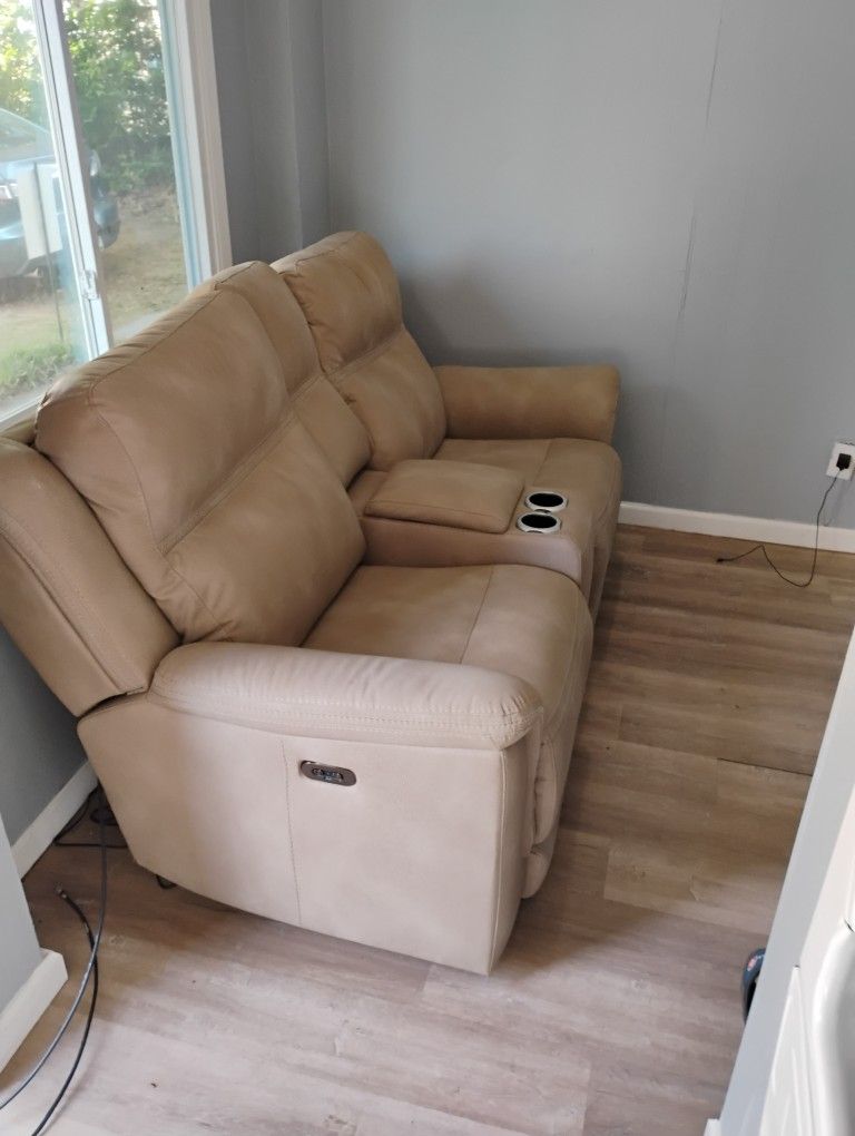 Brand New Ashley Furniture Love Seat.