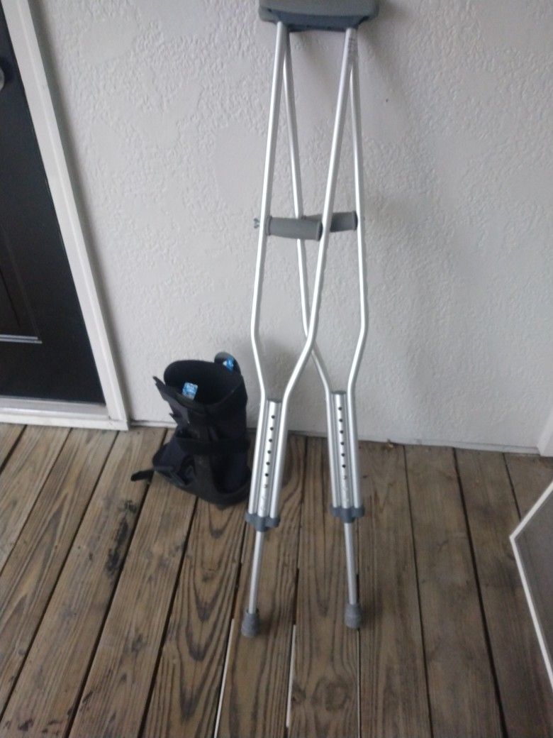 Medical Boot And Set Of Crutches