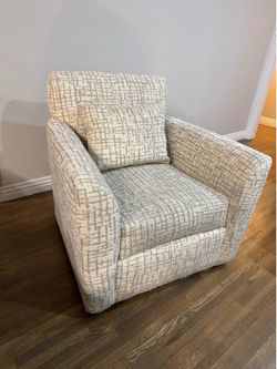 Swivel sofa chair in beige