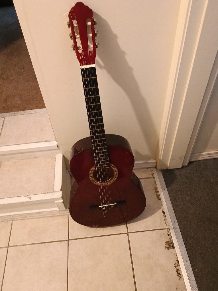 Guitar 40 Inches Long $ 35 Firm Price