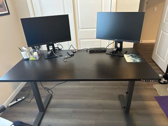Stand up desk with power source