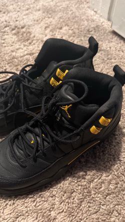 Black ft gold Jordan’s