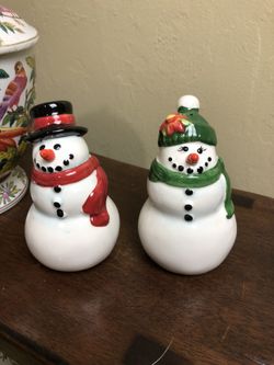 A Pair Of Salt & Pepper Shakers
