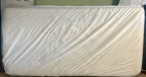 Twin Bed, with box spring and wheeled frame
