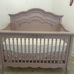 purple baby crib
