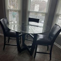 Black glass top breakfast table. 