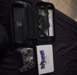 Nintendo Switch OLED with Case and Controller