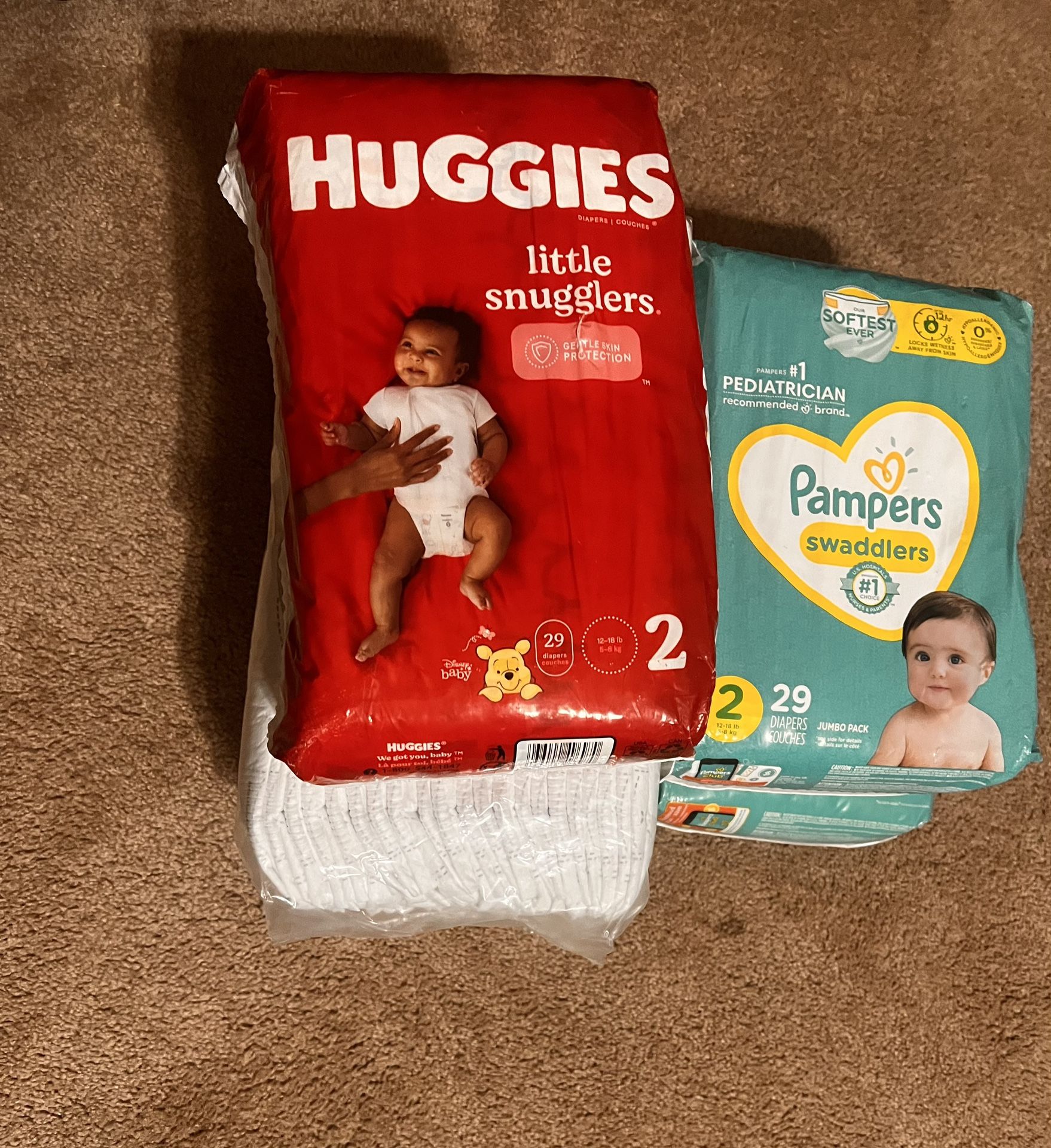 4 Pampers And 1 Huggies For 2 Months Baby