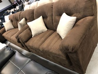 Brand new sofa and loveseat available in store