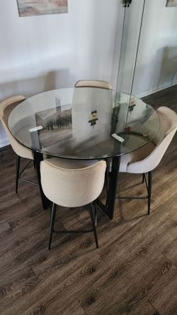 Glass dining room table and chairs
