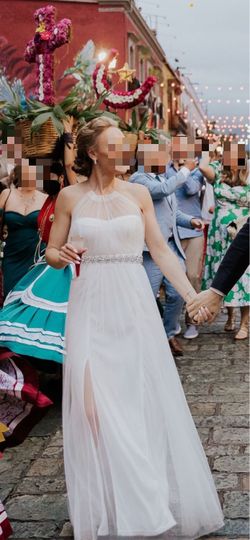 White Wedding dress with added bridal belt.