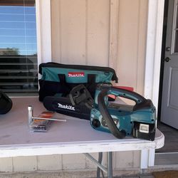Makita Chainsaw With Accessories 
