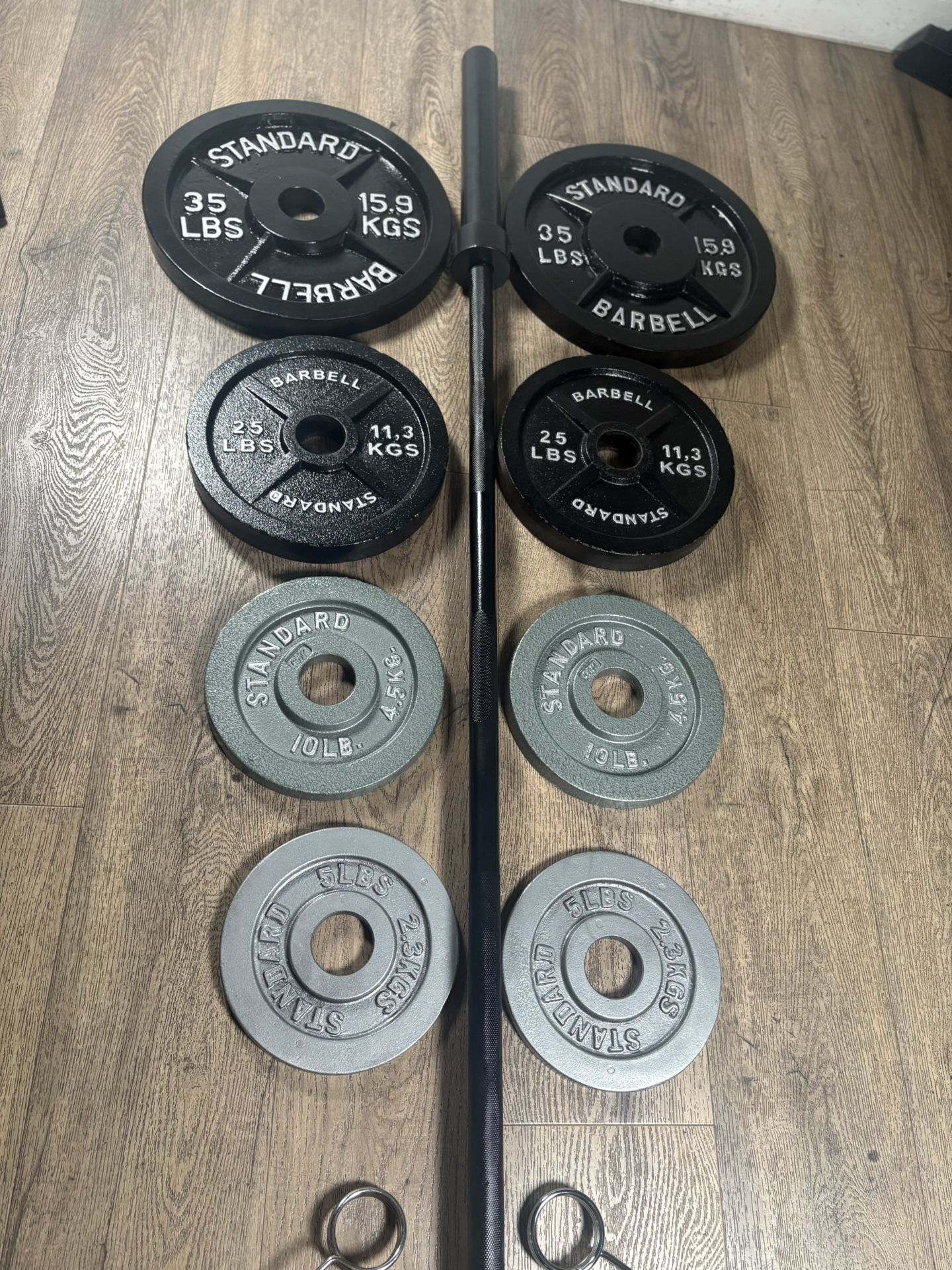 CUZ NEED THE $$ Olympic Equipment: 7 ft Bar & Weight Plates...