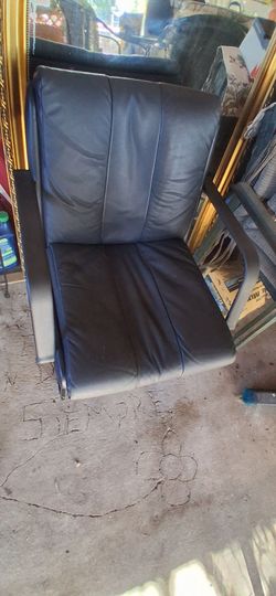 Heavy black leather chair