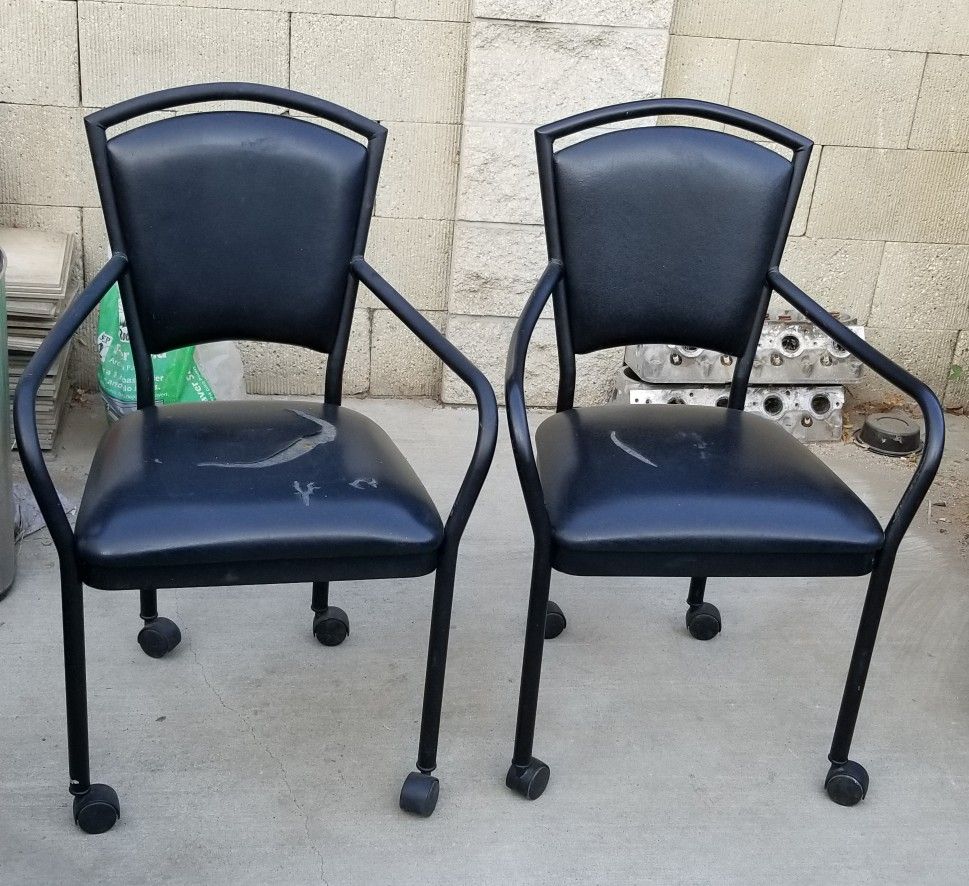 Set of two black chairs.