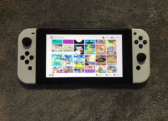 NINTENDO SWITCH with 100 Switch Games + 7000 Retro Classic Games