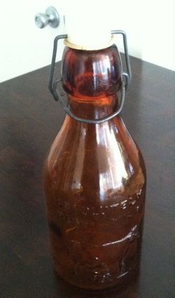 VINTAGE AMBER MILK BOTTLE 1965