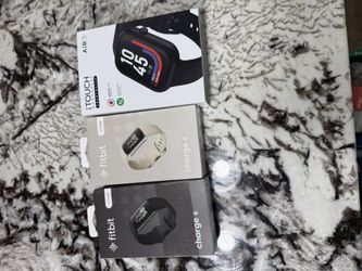 2 - Fit Bit Watches 1 I touch Air 5