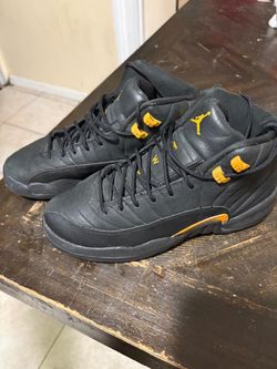 Air Jordan 12 Black Taxi Sneakers
