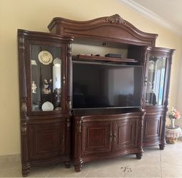 Kevin Charles wood wall unit entertainment center