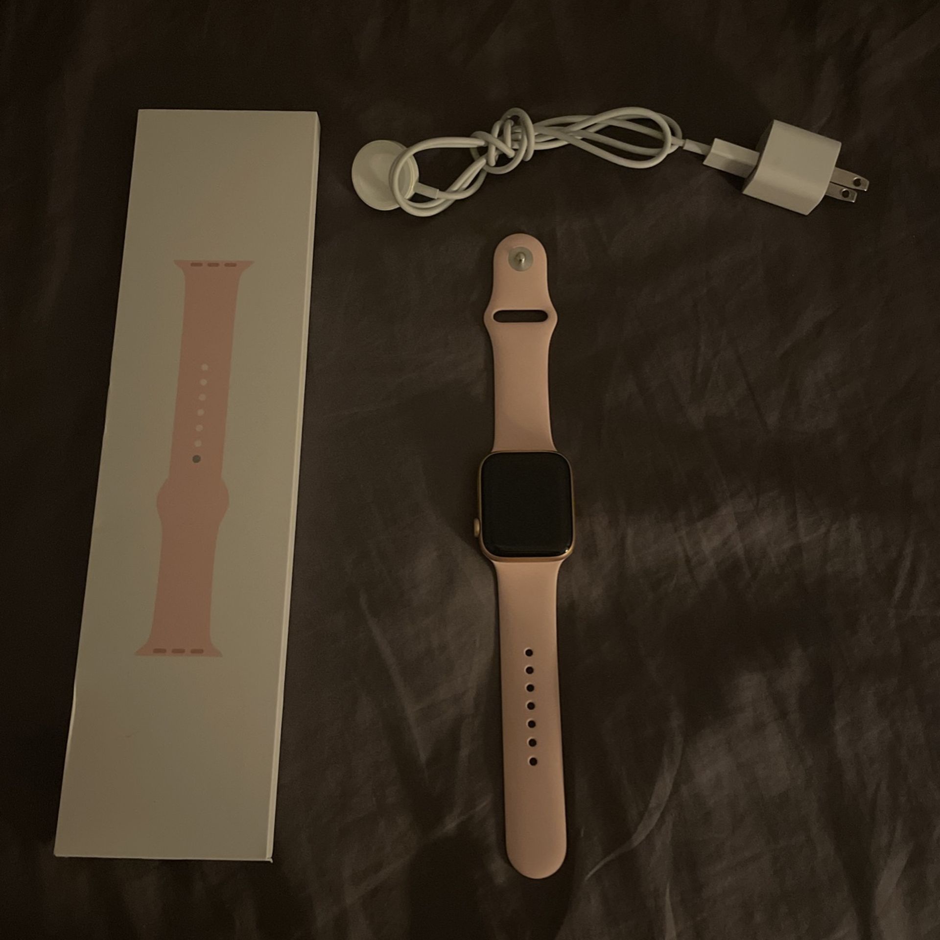 Apple Watch Series 6  44mm Aluminum & Ceramic Case. It Comes with Small Medium and Large Wrist Band. Color Rose Gold. Charger Included & Box 