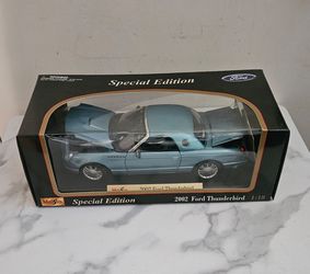 Special Edition Maisto 2002 Aqua Blue Ford Thunderbird 1:18 Scale, in Box.