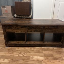 Coffee table with lift top and storage