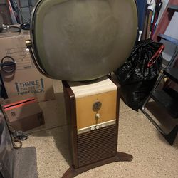 Philco Predicta “Barber Pole” console television from 1958 in walnut.