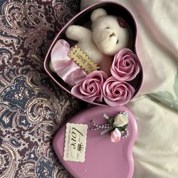 Bear with flowers in a heart
