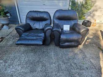 Rocking gray leather recliners $200 each or $350 for the pair