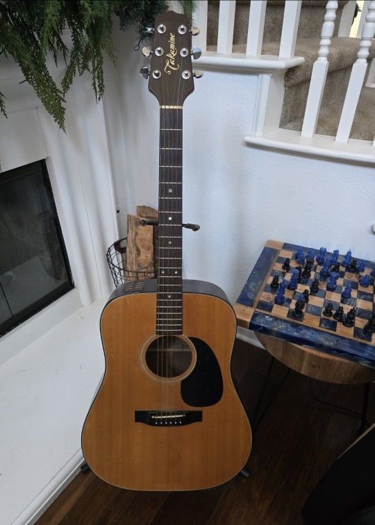 1986 Takamine EF-340 is a dreadnought acoustic-electric guitar
