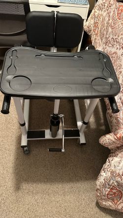 Transfer chair with food tray and potty toilet attached $200.00