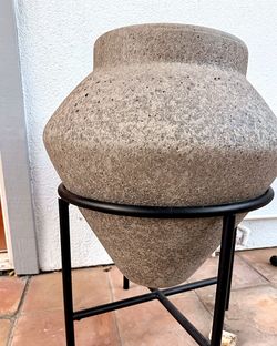 Pottery Barn Textured Stone Planter with Black Metal Stand