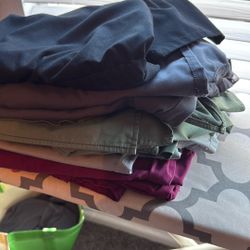 4 Sets of scrubs plus one scrub top