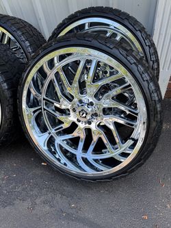 NEW 26x12 TIS chrome wheels wrapped in RBP RT tires. 305/30r26 same as a 33