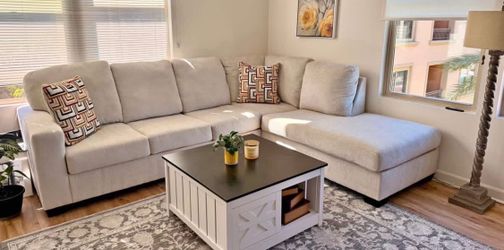 Like New 2 pcs Sectional Furniture with Chaise Cream color Ashely's Furniture