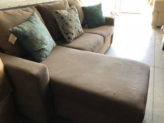 Gray sectional w a bed and storage