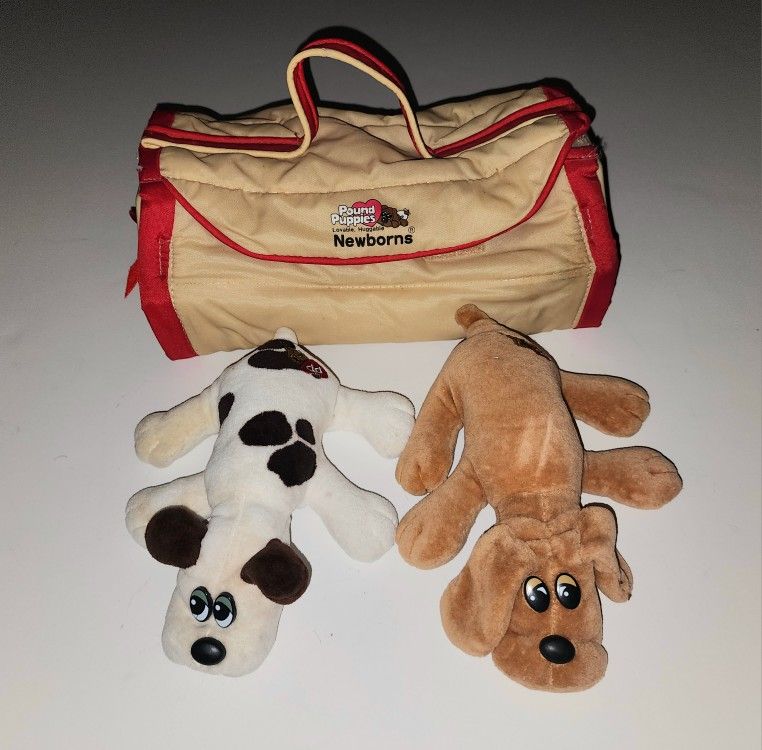 pair of Vintage 80s Pound Puppies Newborns with carrier