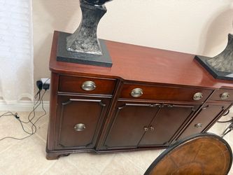 Only display table eagle on the top is not for sale just the The antique buffet High: 36” inches Wide: 60” inches Deep: 18” inches