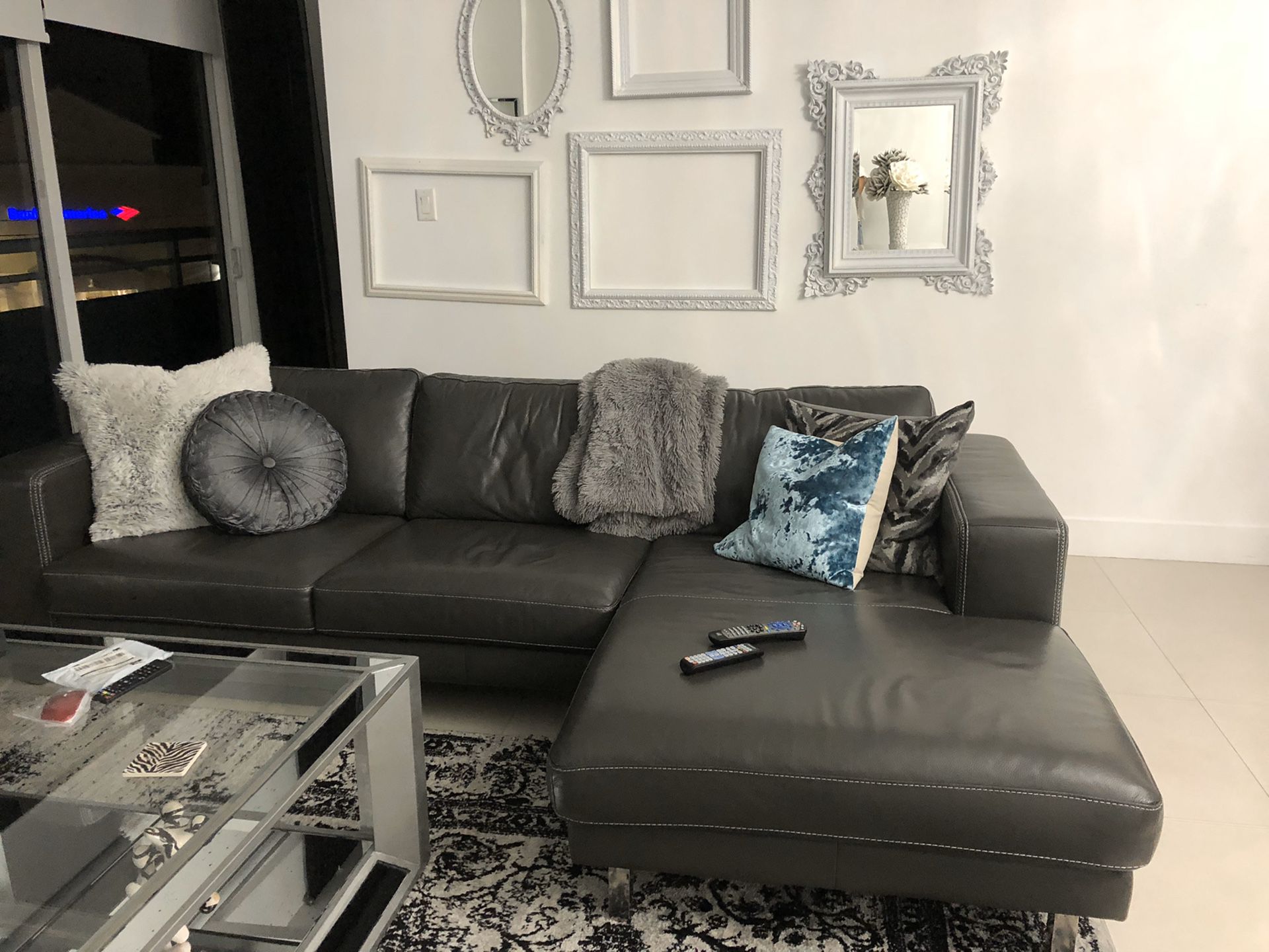 Gray leather sectional couch