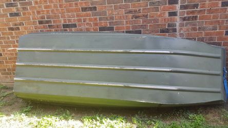 Alumacraft boat and trolling motor 5 speeds