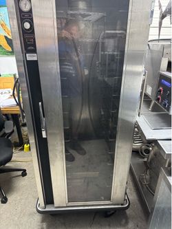 Mobile heated cabinet