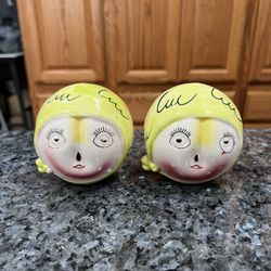 Vintage 1950s Peach Head Anthropomorphic pair of Salt and Pepper Shakers.  The  bottom has Japan stamped on it.  Also on the bottom is the name and da