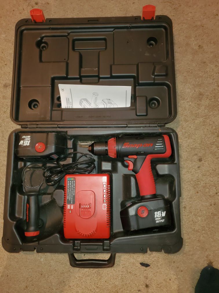 Snap on 18 volt high out put cordless drill with 2 batteries charger and case like brand new